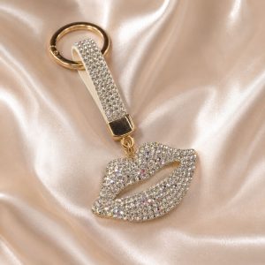 Cuelga cartera llavero strass plateado